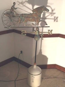 lot 214 image: Weather Vane In Pottery Stand