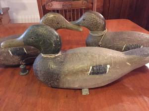 lot 230 image: Three Vintage Solid Wood Decoys