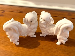 lot 254 image: Two Porcelain Pug Figurines