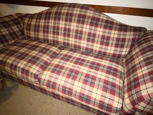 lot 215 image: Plaid Print Upholstered Sofa and Floral Ottoman
