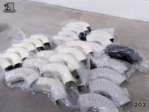 lot 203 image: Assorted Gutter Elbows 2x3 and 3x4 Gutter Elbows 30 pcs Norandex & Edco Mix