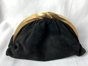 lot 10 image: Donna Karan Clutch