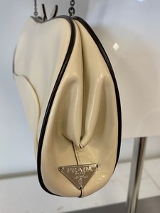 lot 4 image: Prada Clutch with Certificate of Authenticity
