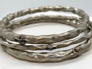 lot 48 image: Three Sterling Bangle Bracelets by Rhonda Faber Green