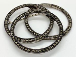 lot 44 image: Sterling Triple Circle Marcasite Brooch