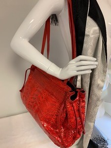 lot 79 image: Red Snakeskin Handbag by DiVina