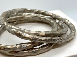lot 184 image: Four Sterling Bangles by Rhonda Faber Green