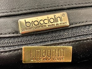 lot 57 image: Purple Suede and Leather Braccialini I. Magnin Handbag