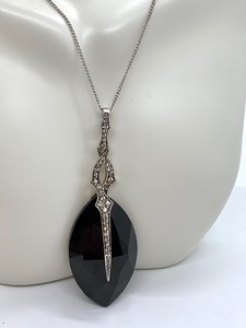 lot 239 image: Faceted Black Stone Pendant