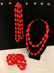 lot 235 image: Three Red Polished Stone Necklaces