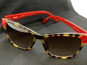 lot 247 image: Michael Kors Sunglasses and Kate Spade Make -Up Bag