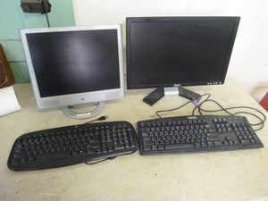 2 Computer Monitors and 2 Keyboards