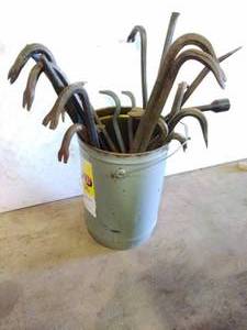lot 40 image: Bucket of Crowbars