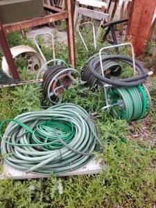 lot 205 image: 3 Hose Caddies & Miscellaneous Hoses