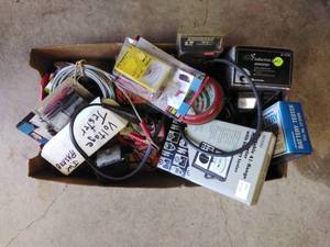 lot 165 image: Box of Battery Testers & More