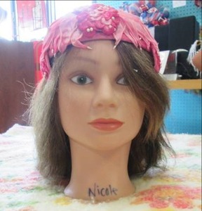 lot 104 image: Female mannequin head with hat...