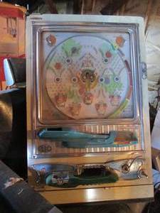 lot 5 image: Spanyko vintage wall hanging pin ba...