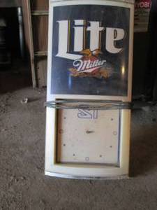 lot 28 image: Miller Lite clock...