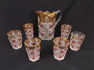 lot 47 image: Vintage 7 Piece Crystal Glass Ruby and Gold Gilded Pitcher Set