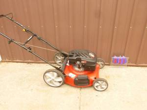 lot 21 image: Yard Machine push mower. Good condition. Tested & works. As shown.