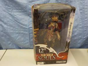 lot 29 image: 12 Clive Barkers Tortured Souls Li...