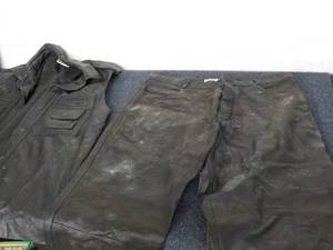 lot 47 image: Leather Vest and Pants needs clean...