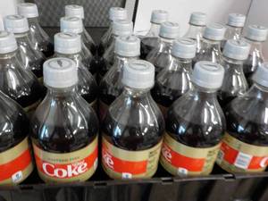 lot 129 image: Case of 24 Bottles Caffeine Free Di...