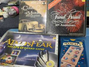 lot 215 image: 4 Games all unopened...