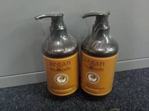 lot 243 image: 2 - 10.1 oz Bottles with Pump top A...