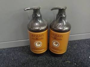 lot 244 image: 2 - 10.1 oz Bottles with Pump top A...