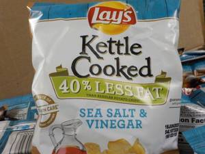 lot 294 image: Case of 64 Bags Lays Sea Salt and V...