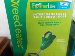lot 346 image: Featherlite Weed Eater new in box...