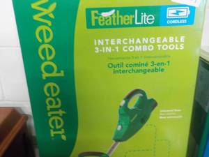 lot 347 image: Featherlite Weed Eater new in box...