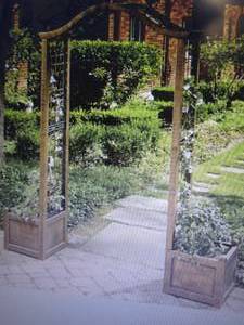 lot 12 image: Garden Arch with Planters open box...