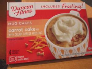 lot 307 image: 6-4pks Duncan Hines Carrot Cake Mug...