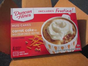 lot 309 image: 6-4pks Duncan Hines Carrot Cake Mug...