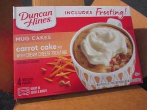 lot 310 image: 6-4pks Duncan Hines Carrot Cake Mug...