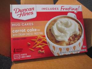lot 311 image: 6-4pks Duncan Hines Carrot Cake Mug...