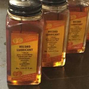 lot 78 image: Record Lubricant conditioning oil