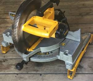 lot 16 image: DW705 Dewalt 12 Compound miter saw