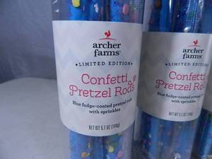 lot 104 image: 9 New Containers of Fudge Covered Pretzel Rods