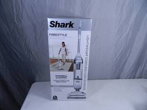 lot 14 image: Brand New Shark Freestyle Cordless Vacuum