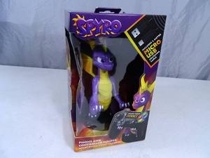 lot 132 image: New Cable Guys Spyro Phone and Controller Holder Charger
