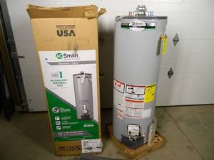lot 1 image: New 40 Gallon Natural Gas Water Heater (shipping dent)