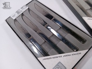 lot 308 image: 2 Sets of 4 Wustoff-trident Knives with cheese knives