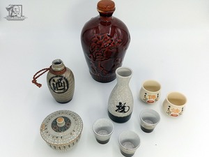 lot 310 image: Japanese Ceramic Jug and 2 Saki Sets