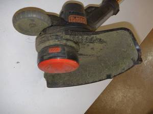lot 29 image: BLACKDECKER 20-Volt Max 10-in Straight Cordless String Trimmer with Edger Capable No battery or charger included.