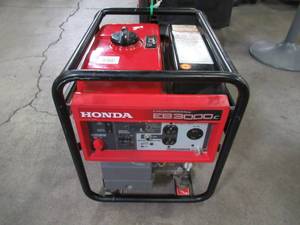 lot 50 image: Honda ndustrial 3000-Watt Lightweight Gasoline Powered CycloConverter Portable Generator with GFCI Protection and Oil Alert EB3000CK2A