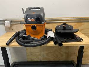 lot 50 image: RIGID 5 Gal. 5.0-Peak HP Portable Wall-Mountable WetDry Shop Vacuum with Filter, Hose and Accessories