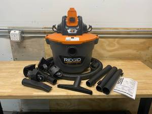 lot 81 image: RIGID 9 Gal. 18-Volt Cordless WetDry Shop Vacuum (Tool Only) with Filter, Hose and Accessories